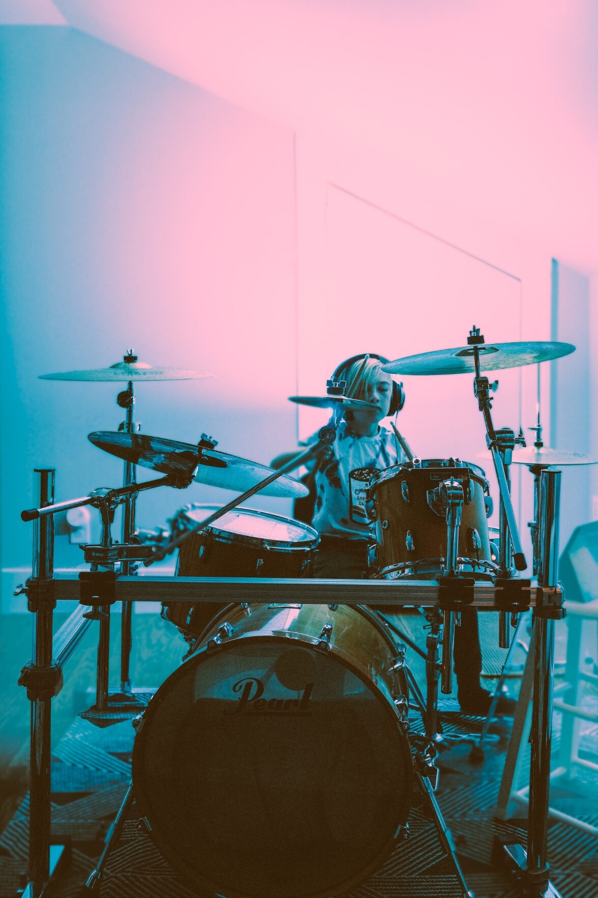 A boy playing the drums