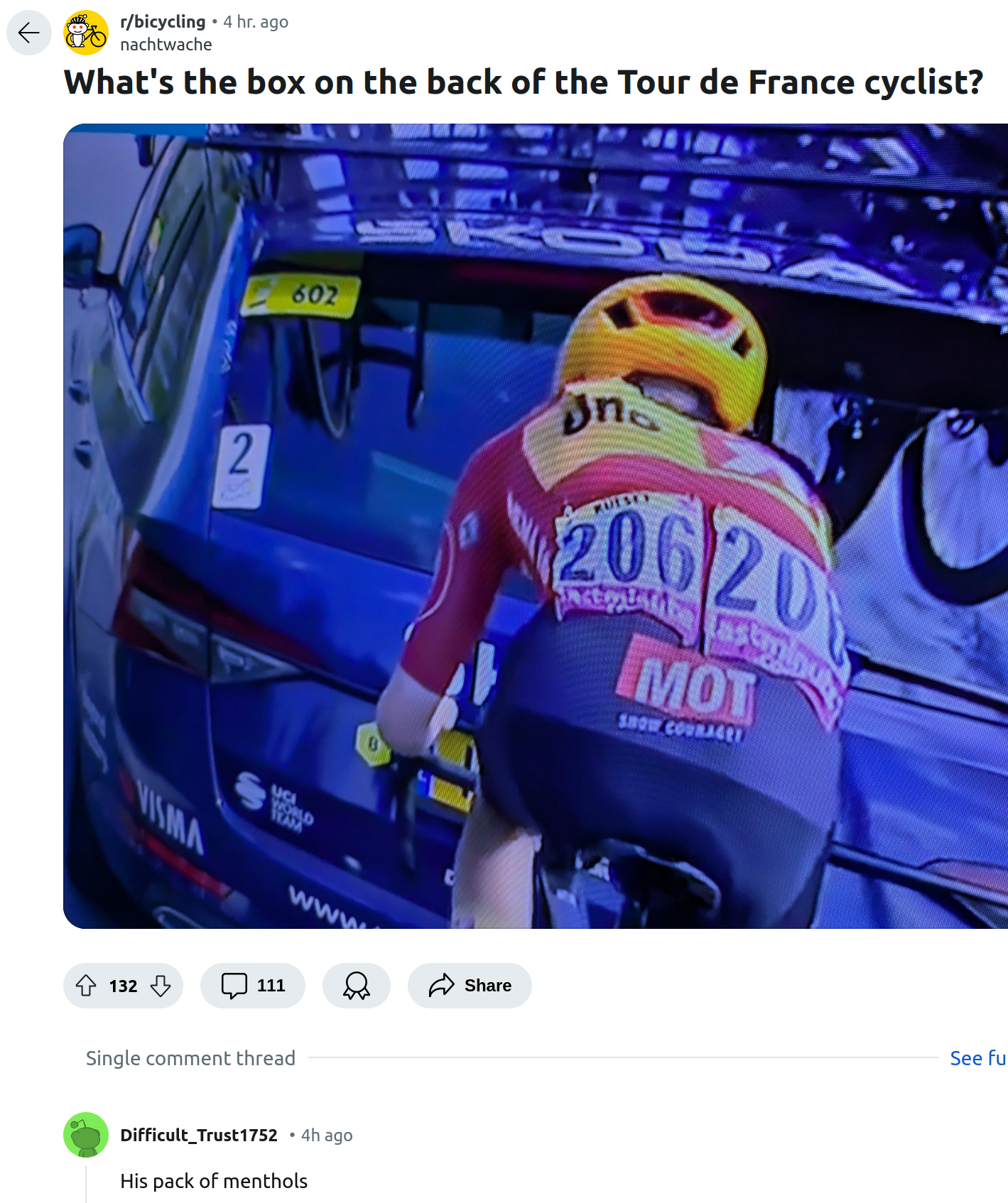 A screenshot of a Reddit post asking what the box bulge on the back of a professional cyclist is. The screenshot shows one comment, "His pack of menthols"