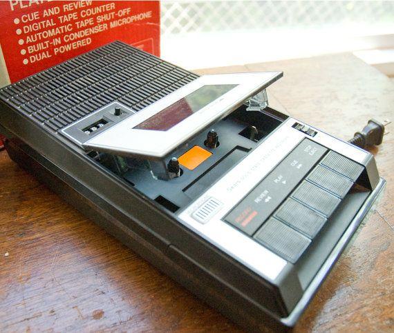 An 80s tape player, the rectangular kind with a smallish speaker in the back, and a microphone somewhere in the front. They were typically for recording your speech, but I used it for listening to 80s pop music in my under-10 years.
